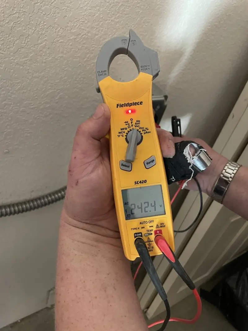 Voltage testing with clamp meter during Ceiling Fan Installation in New Gloucester
